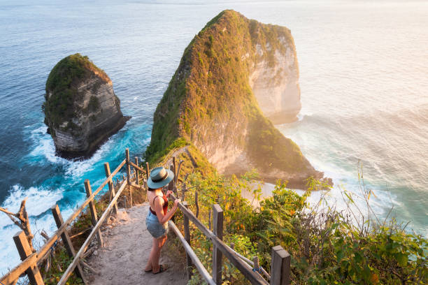 The spectacular T-Rex cliff at Kelingking Beach, the highlight of your West Coast trip.